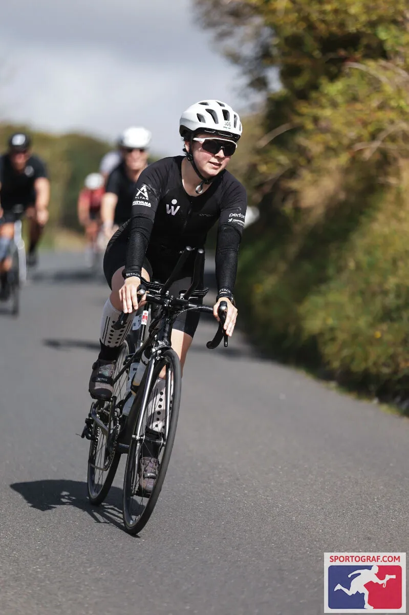 Emily Bond racing on the bike course at IRONMAN 70.3 Weymouth